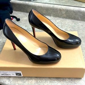 Louboutin pumps. Rubber soul added. Only worn once. Perfect condition